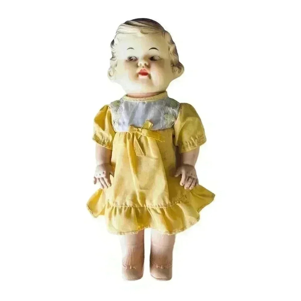 Vintage 1940s Baby Doll Girl with Yellow Dress Movable Arms